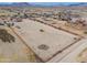 Aerial view of property showing house and large lot at 6210 N Poplar St, Maricopa, AZ 85139