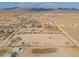 Aerial view of property showing multiple buildings and large lot at 6210 N Poplar St, Maricopa, AZ 85139