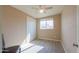 Bedroom with double door closet and wood-look floors at 6210 N Poplar St, Maricopa, AZ 85139