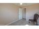 Well-lit bedroom featuring wood-look floors at 6210 N Poplar St, Maricopa, AZ 85139