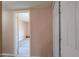 Hallway with access to bedroom and additional rooms at 6210 N Poplar St, Maricopa, AZ 85139