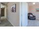 Home hallway with access to living room and bedroom at 6210 N Poplar St, Maricopa, AZ 85139