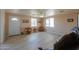 Bright living room featuring tile floors and comfy seating at 6210 N Poplar St, Maricopa, AZ 85139