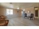 Bright living room with tile floors and southwestern decor at 6210 N Poplar St, Maricopa, AZ 85139