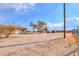 Large side yard with gravel and desert landscaping at 6210 N Poplar St, Maricopa, AZ 85139