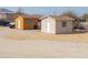 Two storage sheds in a desert landscape at 6210 N Poplar St, Maricopa, AZ 85139