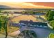 Aerial view of home with circular driveway, surrounded by desert landscape at 6212 S 37Th St, Phoenix, AZ 85042