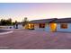 White single story home with circular driveway and mature trees at 6212 S 37Th St, Phoenix, AZ 85042