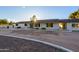 Front view of the house with driveway and landscaping at 6212 S 37Th St, Phoenix, AZ 85042