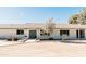 Front view of a remodeled home with teal front doors at 6212 S 37Th St, Phoenix, AZ 85042