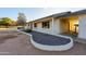 Side view of the house with landscaping at 6212 S 37Th St, Phoenix, AZ 85042