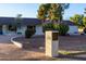 Landscaped front yard with mailbox and circular driveway at 6212 S 37Th St, Phoenix, AZ 85042