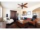 Comfortable living room with leather couch and a brick fireplace at 6212 S 37Th St, Phoenix, AZ 85042