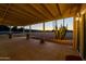 Covered patio with a view of the pasture and cacti at 6212 S 37Th St, Phoenix, AZ 85042