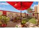 Small backyard with patio furniture and artificial turf at 625 N Hamilton St # 11, Chandler, AZ 85225