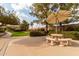 Community patio area with table and benches at 625 N Hamilton St # 11, Chandler, AZ 85225