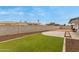 Backyard with artificial turf and patio at 6252 E Billings St, Mesa, AZ 85205