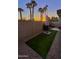 Private backyard oasis with artificial turf and sunset views at 6301 N 12Th St # 8, Phoenix, AZ 85014