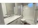 Clean bathroom with granite countertop, bathtub, and tile shower at 6301 N 12Th St # 8, Phoenix, AZ 85014