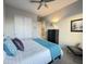 Second bedroom with a comfortable bed and plenty of closet space at 6301 N 12Th St # 8, Phoenix, AZ 85014