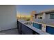 View from private balcony showcasing modern townhome and neighborhood at 6301 N 12Th St # 8, Phoenix, AZ 85014