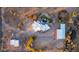 Bird's-eye view of the property showing a large home, pool, and barn at 6469 S Alameda Rd, Gold Canyon, AZ 85118