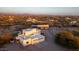 Aerial view of a house, barn, and surrounding landscape at 6469 S Alameda Rd, Gold Canyon, AZ 85118