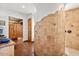 Bathroom features a large walk-in shower, double sinks, and terracotta tile floors at 6469 S Alameda Rd, Gold Canyon, AZ 85118