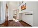 Bright entryway with tile floors, coat hooks, and view of bedroom at 6469 S Alameda Rd, Gold Canyon, AZ 85118