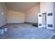 Unfinished garage with concrete flooring at 6469 S Alameda Rd, Gold Canyon, AZ 85118