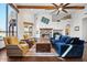 Bright and airy living room with a cozy fireplace at 6469 S Alameda Rd, Gold Canyon, AZ 85118