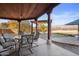 Covered patio furniture with mountain views at 6469 S Alameda Rd, Gold Canyon, AZ 85118