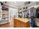 Large walk-in closet with ample shelving and hanging space at 6469 S Alameda Rd, Gold Canyon, AZ 85118