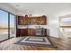 Wet bar with wood cabinetry and wine cooler at 6469 S Alameda Rd, Gold Canyon, AZ 85118