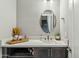 Modern bathroom with double vanity and a large mirror at 7363 E Casitas Del Rio Dr, Scottsdale, AZ 85255