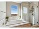 Relaxing bathroom with soaking tub and walk-in shower at 7363 E Casitas Del Rio Dr, Scottsdale, AZ 85255