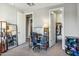 Bedroom with a workspace, closet, and built-in shelving at 7363 E Casitas Del Rio Dr, Scottsdale, AZ 85255