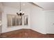 Dining area with hardwood floors and window seat at 7740 E Gainey Ranch Rd # 13, Scottsdale, AZ 85258