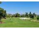 Scenic golf course view with mountains in the background at 7740 E Gainey Ranch Rd # 13, Scottsdale, AZ 85258