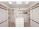 Large walk-in closet with ample shelving and drawers at 7740 E Gainey Ranch Rd # 13, Scottsdale, AZ 85258