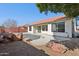 Backyard view of home with pool and patio at 8527 W Aster Dr, Peoria, AZ 85381