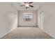 Bedroom with double door closet and ceiling fan at 88 E Macaw Ct, San Tan Valley, AZ 85143