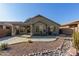 House exterior showcasing desert landscaping and patio at 88 E Macaw Ct, San Tan Valley, AZ 85143