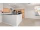 Kitchen with wood cabinets, stainless steel appliances at 88 E Macaw Ct, San Tan Valley, AZ 85143