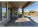 Covered patio with tile flooring and access to backyard at 88 E Macaw Ct, San Tan Valley, AZ 85143