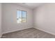 Bright bedroom featuring a large window and neutral walls at 9227 E Sector Dr, Mesa, AZ 85212