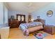 Bright bedroom featuring a queen-size bed and ample closet space at 9502 W Shasta Dr, Sun City, AZ 85351