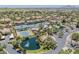 Aerial view of community with tennis courts and pond at 9708 E Via Linda -- # 2313, Scottsdale, AZ 85258