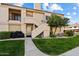 Condo entrance with walkway, landscaping, and grill at 9708 E Via Linda -- # 2313, Scottsdale, AZ 85258