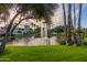 Peaceful pond with fountain and palm trees at sunset at 9708 E Via Linda -- # 2313, Scottsdale, AZ 85258